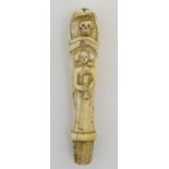 Religious Saint / Friendly Society figure ? : a carved bone / ivory stick top / knife handle with