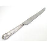 A silver handled cake knife 10 1/2" long CONDITION: Please Note - we do not make