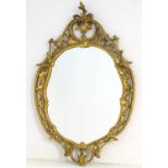 A Chippendale style giltwood mirror.
