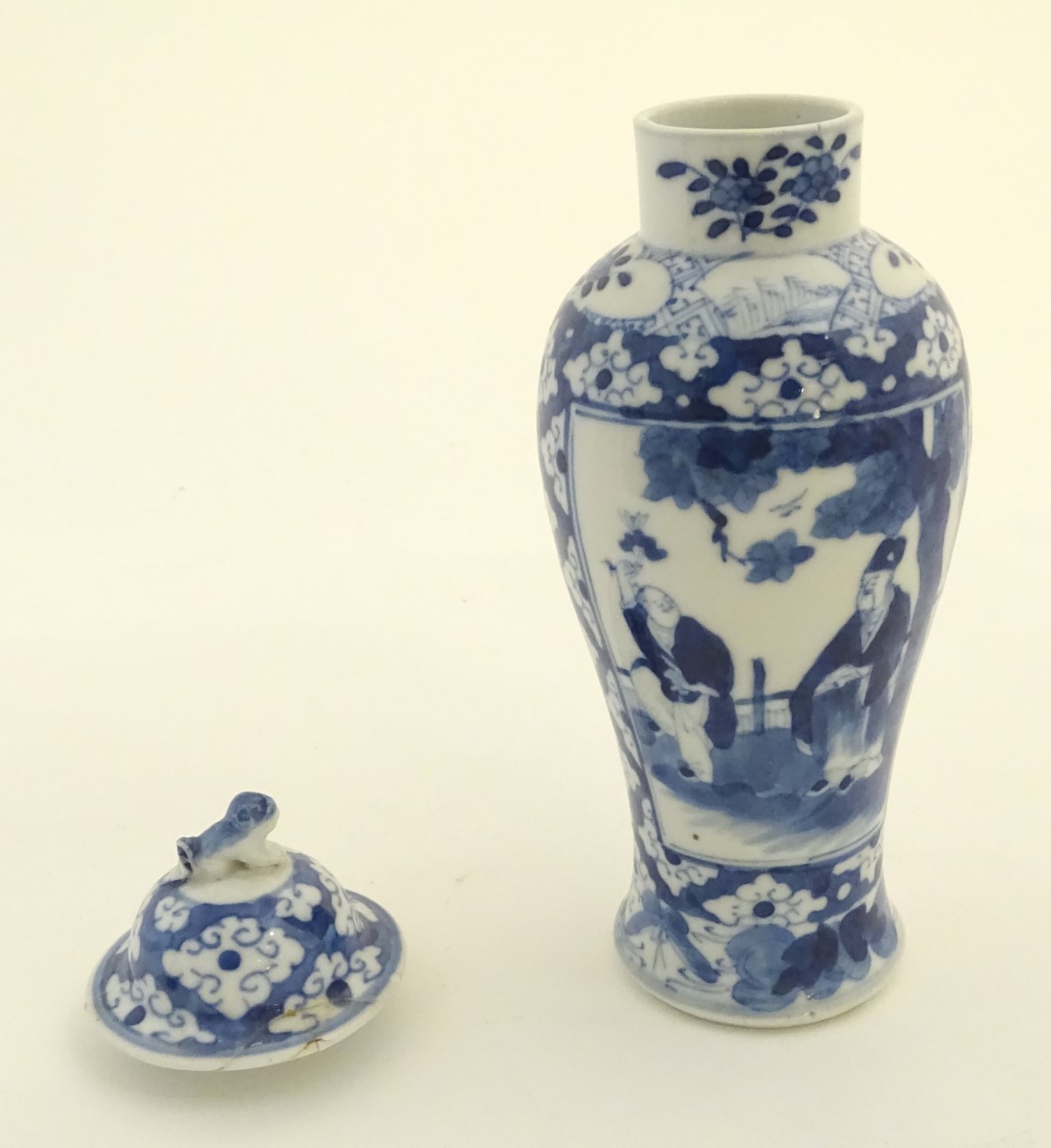 A Chinese blue and white ginger jar decorated with a floral pattern and two panels depicting an - Image 2 of 7