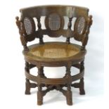 A late 18thC oak Burgomeister chair,