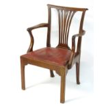 An early / mid 19thC Chippendale style open armchair with a fanned pierced back splat,