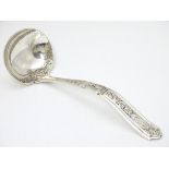 An American silver ladle, maker Gorham Manufacturing Co.