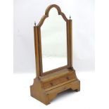 A Queen Anne style mahogany toilet mirror / dressing mirror with shaped top.