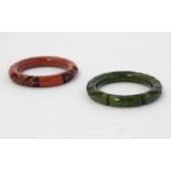 Chinese lacquer bracelets, two engraved green and cinnabar lacquer bangle bracelets.