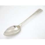 A Geo III silver old English pattern table spoon hallmarked London 1776 maker TC 8 3/4" long (68g)