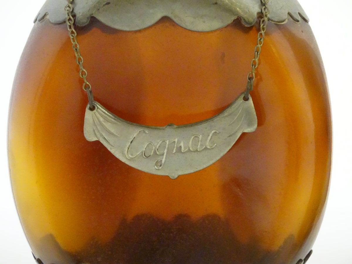 A pair of dimple like brown glass and pewter mounted decanters with bottle tags marked 'Cognac' & - Image 3 of 16