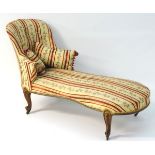 A late 19thC rosewood chaise longue, with scrolled armrests and standing on French scrolled feet.