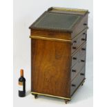 A Regency rosewood Davenport with brass gallery and gold tooled leather slope,