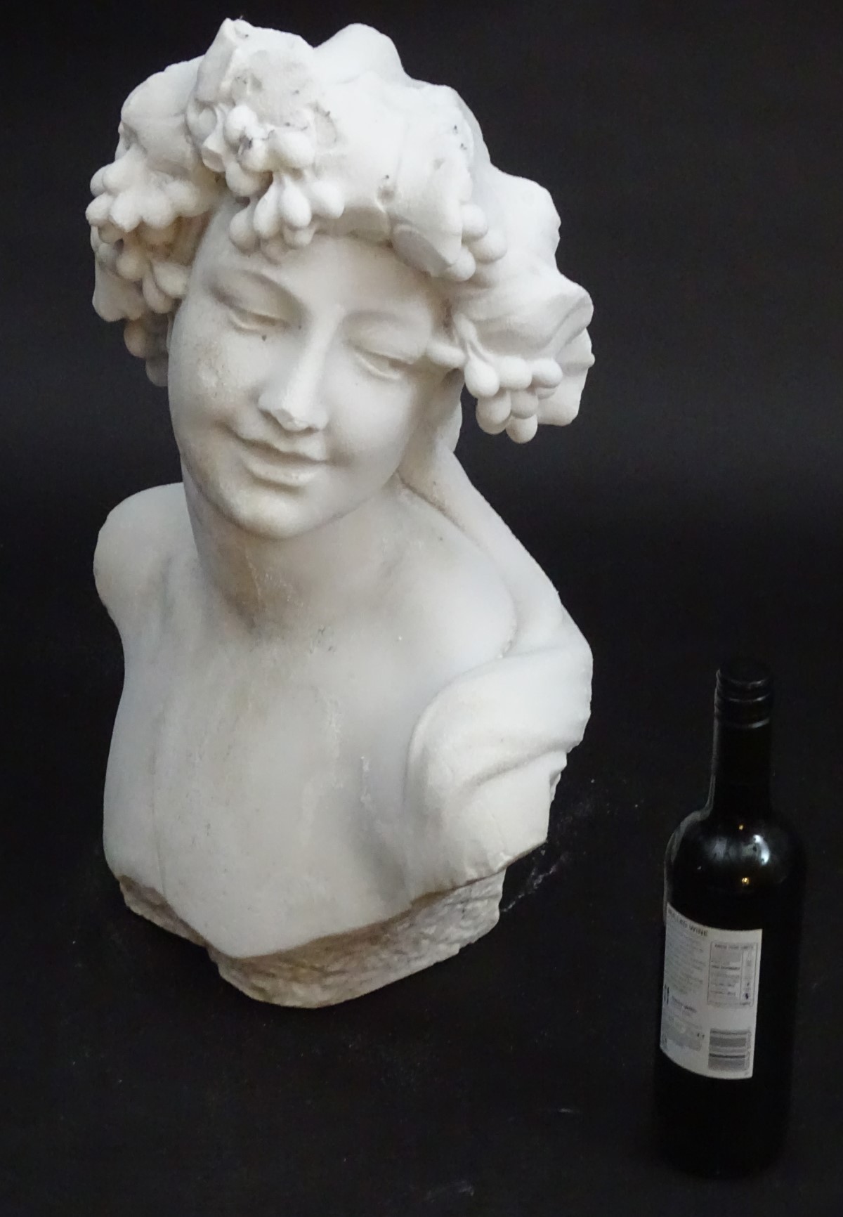 A reconstituted marble sculpture: bust of Bacchus, Roman God of Wine, Agriculture and fertility. - Image 3 of 18