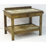 A late 19thC washstand in the manner of Charles Locke Eastlake with a single short drawer,