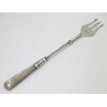 A silver pickle fork hallmarked Birmingham 1921 maker Adie Lovekin Ltd with mother of pearl handle