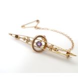 A 9ct gold bar brooch set with central amethyst 2” long CONDITION: Please Note - we