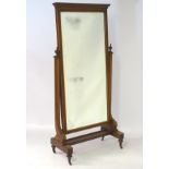 An Edwardian mahogany cheval mirror of large proportions,