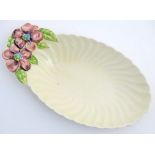 A Royal Staffordshire scalloped oval shaped dish designed by Clarice Cliff,