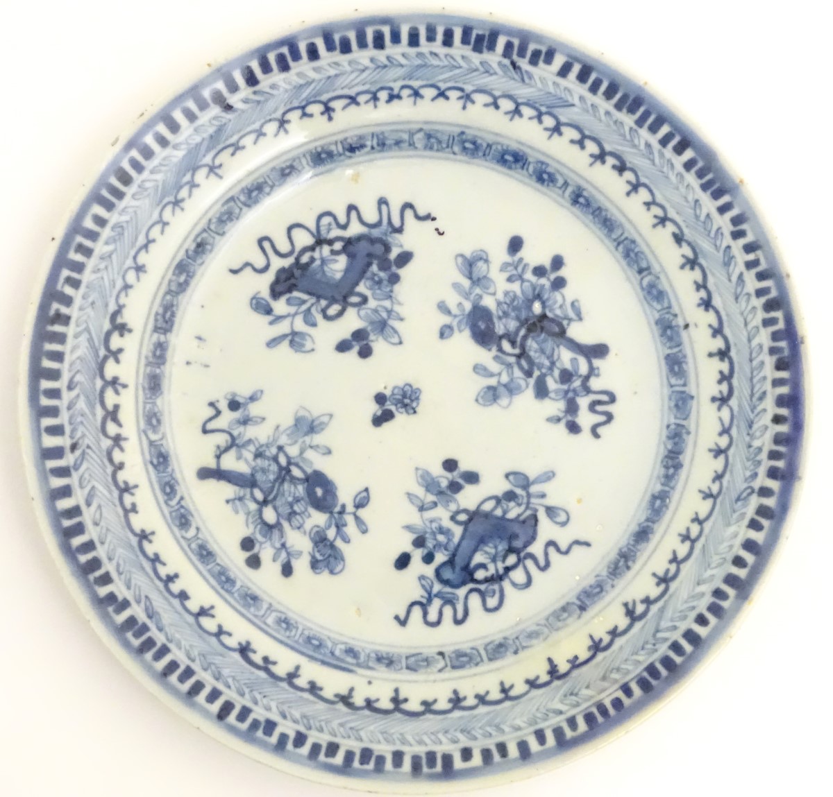 An 18thC Chinese blue and white plate decorated with Daoist emblems, and banded patterned borders. - Image 6 of 8