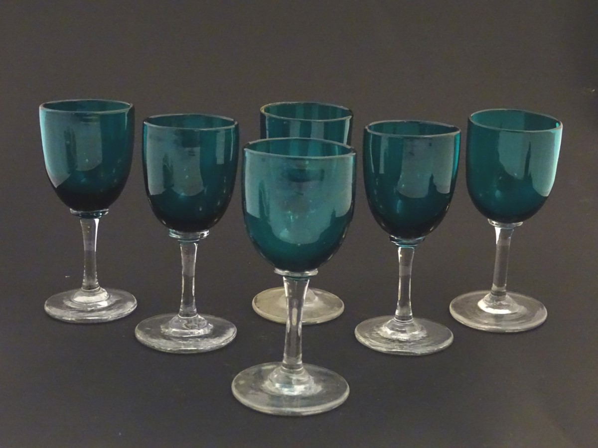 Glass : a set of 6 green / Turquoise pedestal wine glasses with clear glass stems and feet,