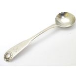A silver fiddle and shell pattern salt spoon hallmarked Edinburgh 1819 maker James Smith 4" long