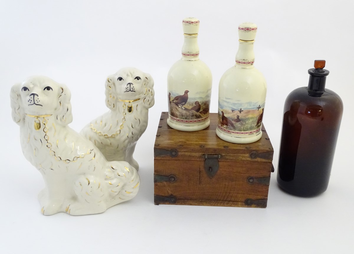 Assorted items to include, two Staffordshire Pottery seated spaniels with gilt highlights,