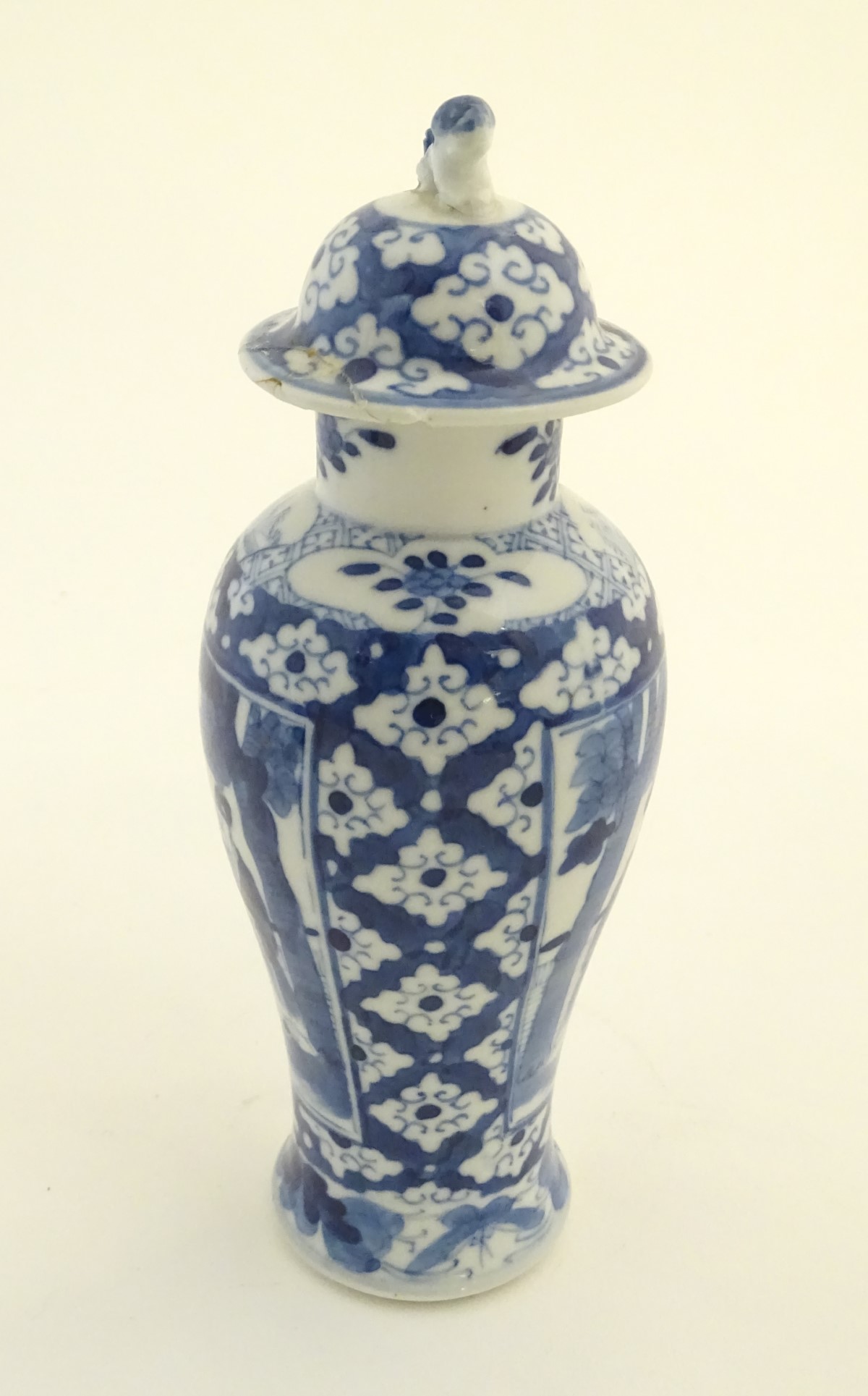 A Chinese blue and white ginger jar decorated with a floral pattern and two panels depicting an - Image 4 of 7