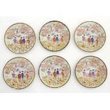 Six Japanese plates depicting figures in traditional dress in an Oriental landscape depicting Mount