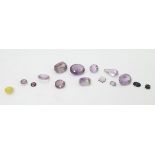 Assorted unmounted / loose stones including various cut amethysts etc CONDITION: