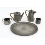 Arts and Crafts: a 4 piece pewter tea service by 'Craftsman Pewter Sheffield',