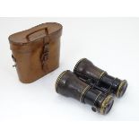 A cased pair of WWI-era French multi-use binoculars,