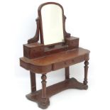 A late 19thC mahogany dressing table,
