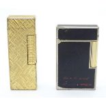 A Dunhill 'Rollagas' lighter, in gold-plated crosshatched 'Florentine' finish,