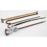 Walking Sticks: An assortment of 5 sticks,