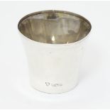 A silver tot cup hallmarked Birmingham 1975 maker ESC 1 3/4" high (22g) CONDITION: