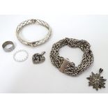 Assorted silver jewellery including a silver bracelets, pendants,
