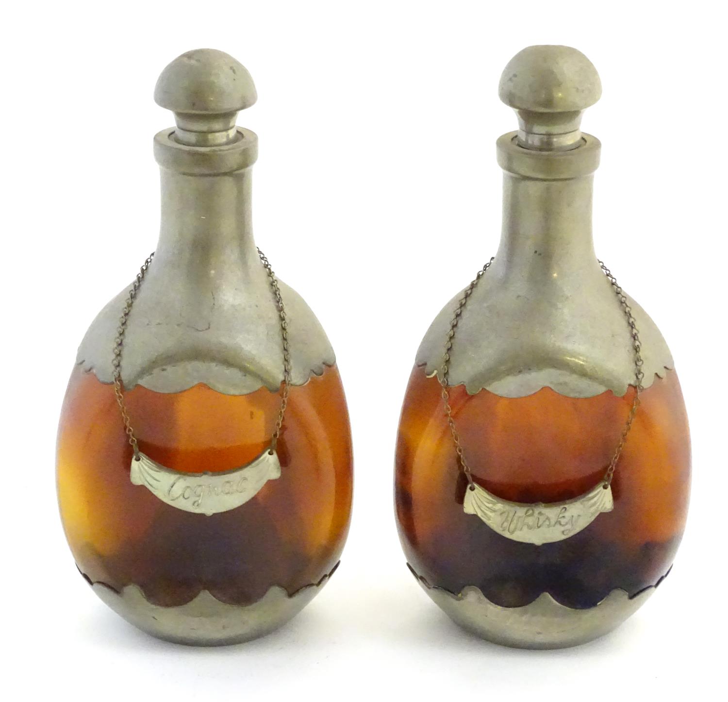A pair of dimple like brown glass and pewter mounted decanters with bottle tags marked 'Cognac' & - Image 2 of 16