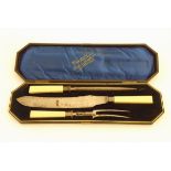 A cased 3 piece ' John McClory and Sons , Sheffield ' carving set ,