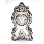 A mantle clock with silver mounts hallmarked Sheffield 1988 maker Carrs of Sheffield 5 1/4" high