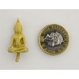 An early 21stC cast and gold finish stupa Buddha in a box, measuring 1" high.