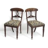 A pair of early / mid 19thC mahogany chairs,