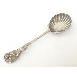 Chinese Export Silver : A Sterling silver preserve spoon with shell formed bowl and dragon