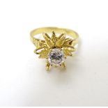 A vintage 18ct gold cocktail ring set with central diamond approx 0.