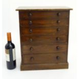 Collector's Cabinet: a mahogany stained pine 6 graduated long drawers collector's cabinet /
