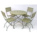 Garden and Architectural Salvage: a French folding Bistro garden/patio set comprising of a circular