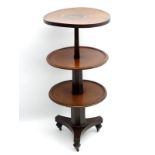 A William IV mahogany three tier dumb waiter,