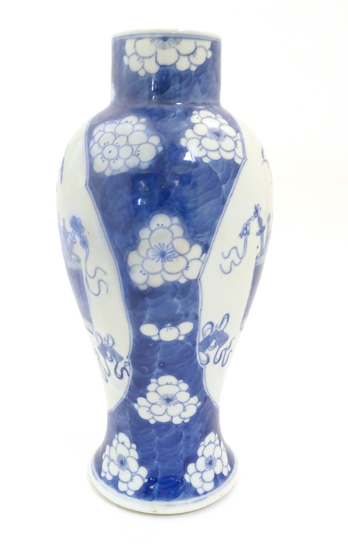 A Chinese, blue and white baluster vase decorated with prunus flowers, - Image 7 of 12