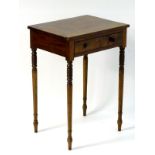 An early 19thC mahogany side table, with a single frieze drawer above four turned tapering supports.