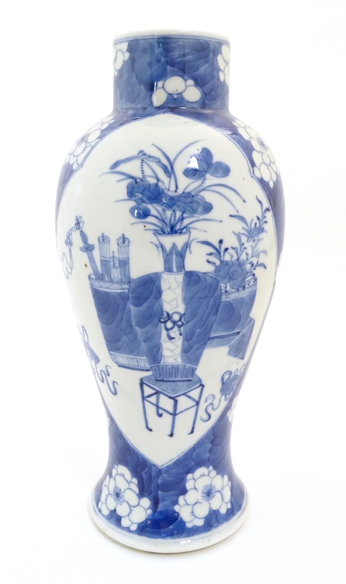 A Chinese, blue and white baluster vase decorated with prunus flowers, - Image 6 of 12
