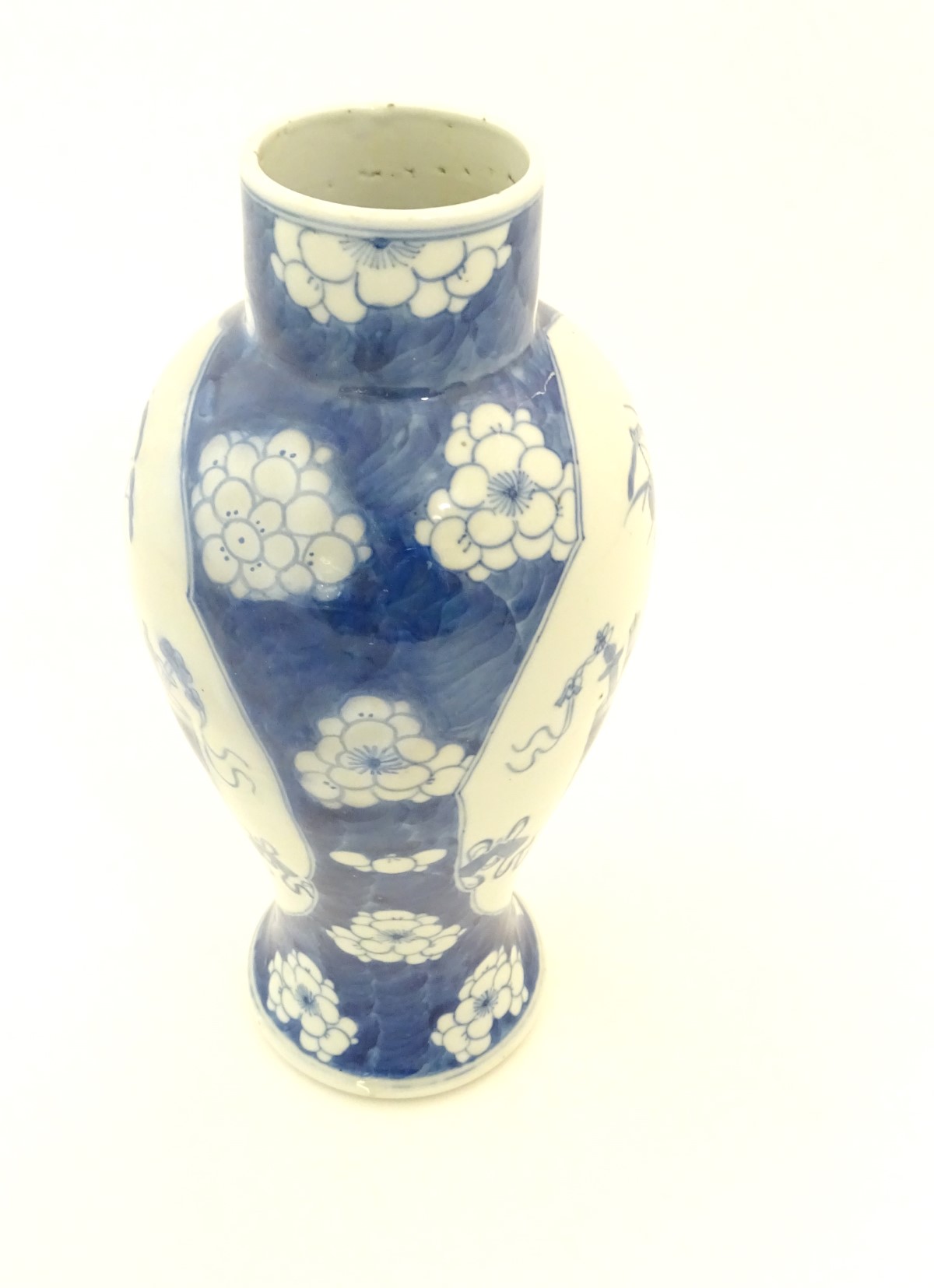 A Chinese, blue and white baluster vase decorated with prunus flowers, - Image 2 of 12
