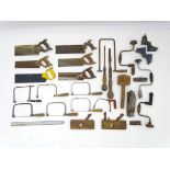 A quantity of carpenters tools to include screw drivers, drill bits saws, mallet,