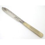 A silver knife with ivory handle hallmarked Sheffield 1909 maker Allen & Darwin.