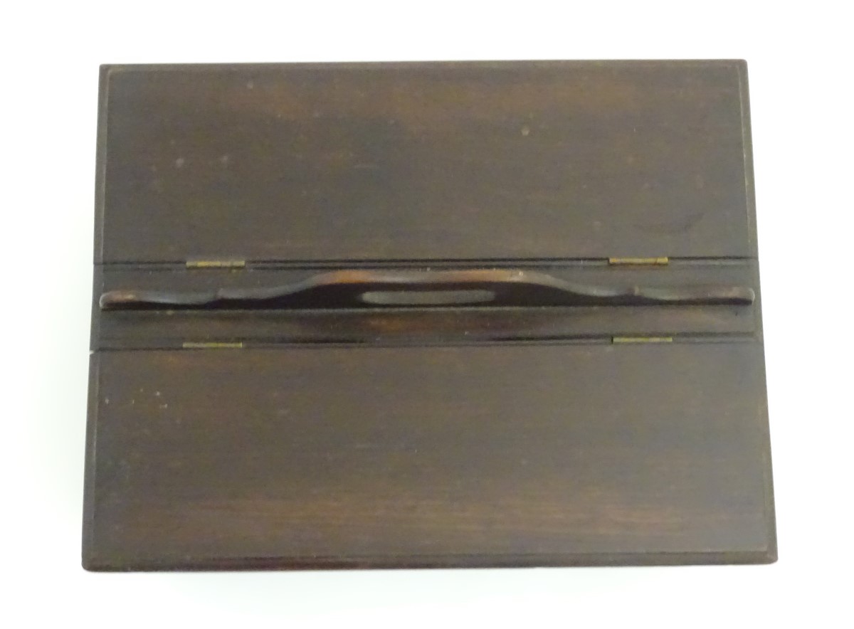 An 18thC dark patinated and hinge lidded mahogany cutlery box with central handle flanked by two - Image 13 of 14